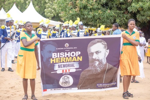 A procession by schoolchildren as part of the celebration