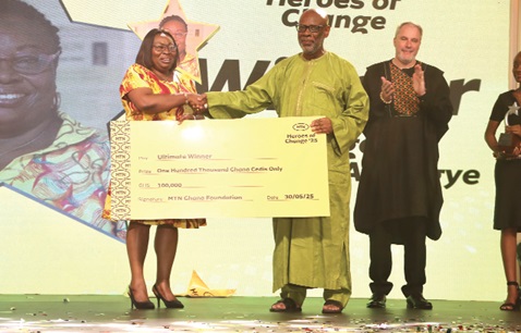 Prof. Franklyn Manu (right), Board Chairman, MTN Ghana Foundation, presenting a dummy cheque to Dr Angela Dwamena-Aboagye (left), Founder, The Ark Foundation, at the event. Picture: ELVIS NII NOI DOWUONA 