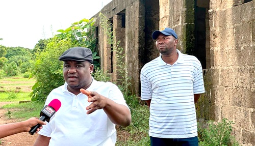 Alhassan Sualihu Dandaawa (left), Deputy Administrator of GETFund, explaining the state of the project. With him is Prof. Emmanuel K. Derbile, (right), VC of SDD-UBIDS