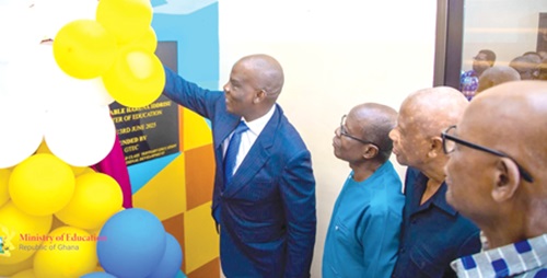 Haruna Iddrisu (left), Education Minister, unveiling the plaque to inaugurate the conference facility (inset), while Paul Effah (2nd from left), former Executive Secretary, NCTE, and Prof. Mahama Duwiejua, Council Chairman of GTEC, look on