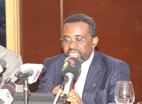 Dr Johnson Pandit Asiama (inset), Governor, BoG, addressing members of the Association of Ghana Industries