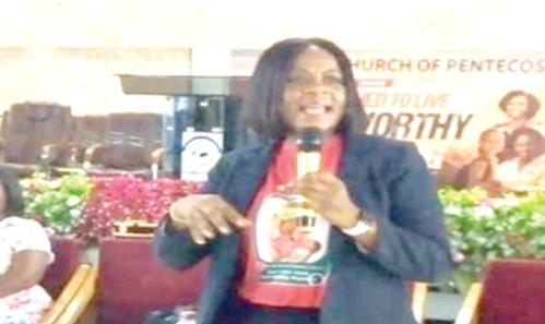 Dr Sophia Quist, the Ashaiman Municipal Director of Health Services, addressing the parents