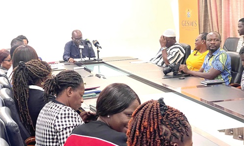 Prof. Ernest Kofi Davis (arrowed), Director-General, Ghana Education Service, addressing the media