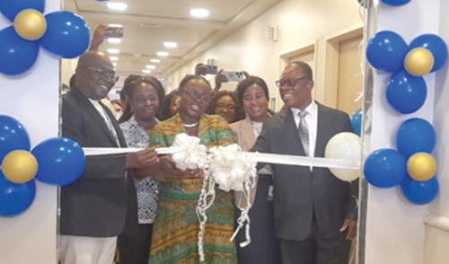 Prof. Nana Aba Appiah Amfo (middle), Vice-Chancellor of the University of Ghana, leading dignitaries to cut the tape to the premises of the human milk bank at UGMC.  On the extreme left is Dr Abdul-Samed Tanko, the CEO of UGMC 