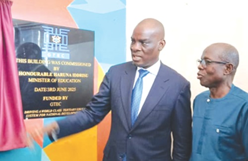 INSET:Haruna Iddrisu (left), Education Minister, and Paul Effah, the first Executive Secretary of NCTE, inaugurating the conference facility