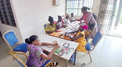 Some of the women with disability busily learning how to make jewellery at Nkurakan