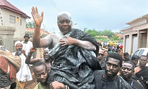 Ofentemfrem Omenasono Dr Bosoma Asor Nkrawiri III, the latest installed chief, being carried through the principal street 