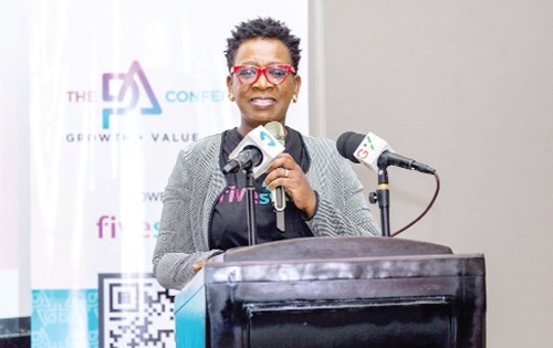 Maame Ekua Gaisey — Managing Partner of FiveSixFive, addressing the media