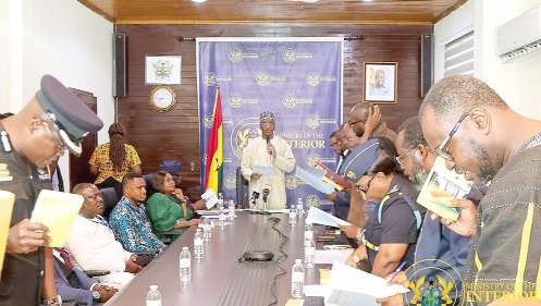 Mohammed Mubarak Muntaka (arrowed), Minister for the Interior, swearing in the newly inaugurated governing board of the Gaming Commission of Ghana