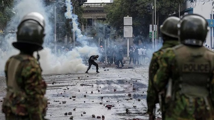 Kenya's interior minister says police officers acted with 'remarkable restraint'