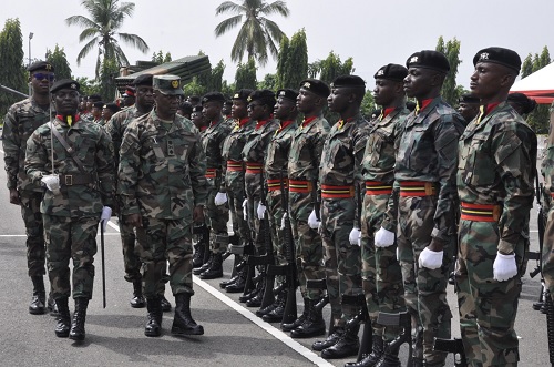 Brigadier General S.Y. Asare (2nd from left), General Officer Commanding the Southern Command, inspecting a guard of honour mounted by a contingent from the 66 Artillery Regiment