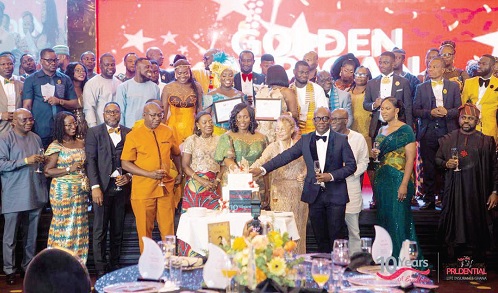 Jane Mingle (arrowed), Prudential Life Insurance Ghana CEO;  Emmanuel Aryee Mokobi (3rd from right), Prudential Africa CEO, joined by other board members and management team to cut the anniversary cake