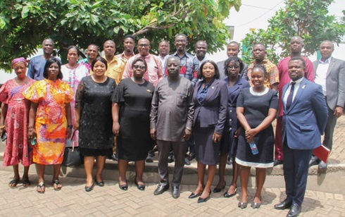 Justice Angelina Mensah-Homiah (4th from left), a Justice of the Court of Appeal, and some legal practitioners with staff of Kuapa Kokoo Cooperative Farmers and Marketing Union Limited, in Kumasi