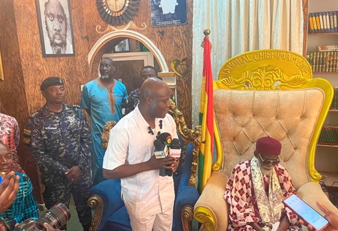 Ahmed Ibrahim (left), Minister of Local Government, Chieftaincy and Religious Affairs, addressing the Chief Imam during the visit