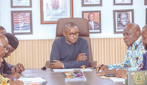  John Abdulai Jinapor (middle), Minister of Energy and Green Transition, addressing the five-member committee during the meeting