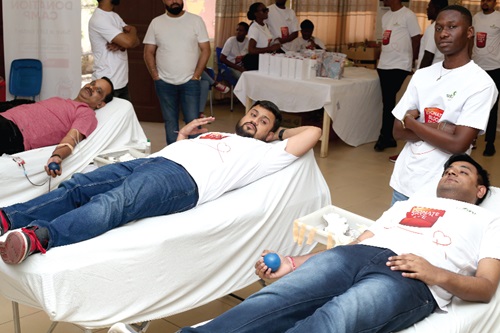 Some workers of Satguru Travels and Tour Services Limited going through the donation process