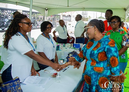 Lordina Dramani Mahama, the First Lady, interacting with some of the health workers during the exercise