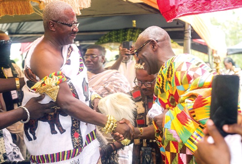 Nana Ansah Sasraku III (right), Chief of Mamfe Akwapim in the Eastern Region, congratulating Daasebre Akuamoah Boateng Ill (left), Omanhene of the Kwahu Traditional Area, during the unveiling. Picture: CALEB VANDERPUYE