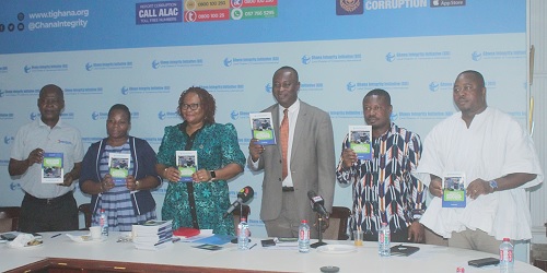 Dr Steve Manteaw (left), Stephen Asantilow (3rd from right), Head, Ethics and Compliance Unit, CHRAJ, Mary Awelana Addah (3rd from left), Executive Director, Ghana Integrity Initiative and Transparency International Ghana, and other dignitaries launching the Beneficial Ownership Report.  Picture: ERNEST KODZI
