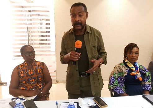 Nana Osei-Bonsu, Chief Executive Officer of PEF, addressing the workshop. With him are Gifty Obeng (right), Operations Manager of GGA-WARO, and Beauty Emefa Narteh, Executive Secretary of  GACC