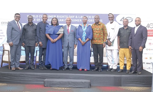Patricia Boateng Bannor (5th from right), Director of Standards, Ministry of Trade and Industry and Agribusiness; Appiah Kusi Adumako (2nd from right), West African Regional Director, CUTS International; Justice Jones Dotse (5th from left), former justice of the Supreme Court; Prof. Alex Dodoo (4th from right), Director- General, Ghana Standards Authority, with some invited guests at the launch. Picture: BENEDICT OBUOBI