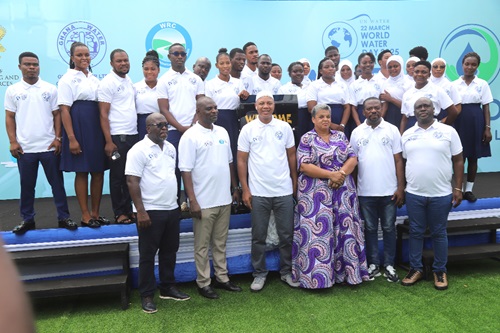 Gizella Tetteh-Agbotui (middle), a deputy minister of Works, Housing and Water Resources, together with Adam Mutawakilu (3rd from left), Managing Director, Ghana Water Limited, Dr Bob Alfa (2nd from left), Executive Director, Water Resources Commission, Rev. Stephen Yaw Osei (2nd from right), Chief Director, Ministry of Works, Housing and Water Resources, and some guests after the celebration.   Picture: SAMUEL TEI ADANO