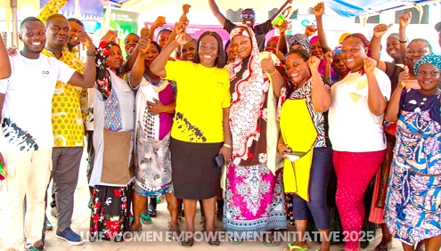  Margaret Davids Opoku-Agyeman (middle), the Founder and Chief Executive Officer of the Lady Margaret Foundation, with a section of the Kotoku Market women who participated in the workshop