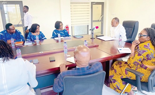 Dr Abdul-Rashid Hassan Pelpuo (2nd from right), Minister of Labour, Jobs, and Employment, speaking to the delegation from Chartered Institute of Human Resource Management 