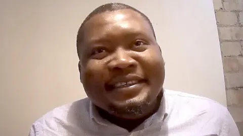 Undercover footage shows Dr Kelvin Alaneme explaining how he sells UK jobs to foreign nationals