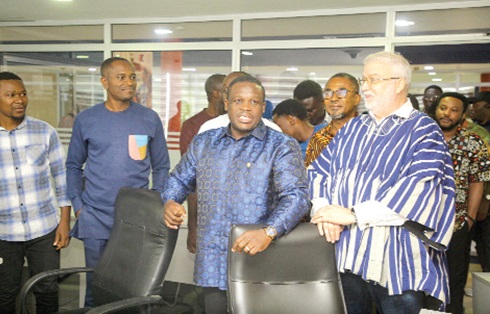 Samuel Nartey George (middle), Minister of Communications, Digital Technology and Innovation, addressing staff of AirtelTigo during the tour with Leo Skarlatos (right), Chief Executive Officer of AirtelTigo. Picture: CALEB VANDERPUYE