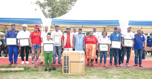  James Gunu (7th from right), Volta Regional Minister, with the awardees