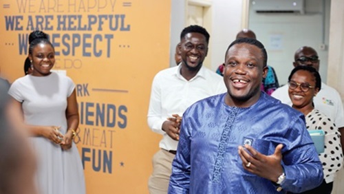 Samuel Nartey George (right), Minister  of Communication, Digital Technology and Innovation, during the visit to ShaQ Express