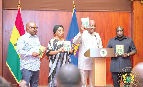 President John Dramani Mahama (2nd from right) with the support of Julius Debrah (right), the Chief of Staff, Valerie Sawyerr (2nd from left), Senior Presidential Advisor, and Dr Calistus Mahama, Secretary to the President, launching the Code of Conduct for political appointees