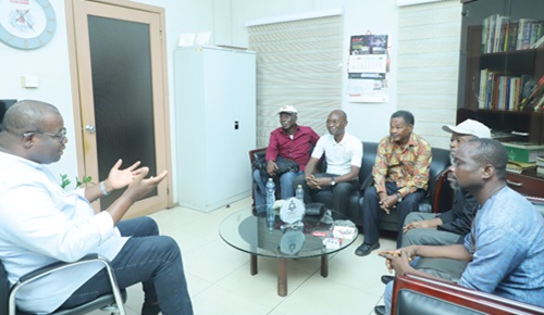 Theophilus Yartey (left), Editor, Graphic, addressing the delegation from the African-Caribbean Manufacturing Limited. Picture: EDNA SALVO KOTEY