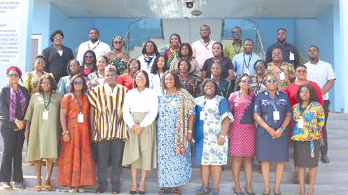 Vera Karikari Bediako (3rd from left), Director, MoGCSP; Sylvia Nutsukpui (5th from left), Director, PPMED, KAIPTC; Joana Opare (5th from right), Dorothy Barnes (4th from right) and the participants during the opening of the workshop in Accra. Picture: BENEDICT OBUOBI