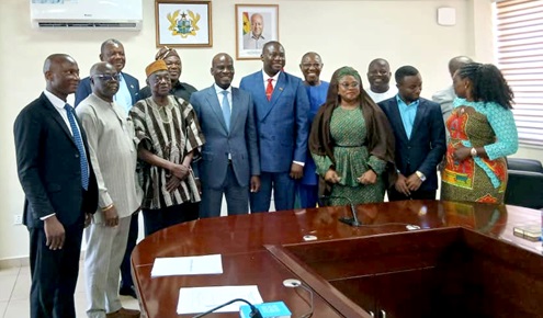Haruna Iddrisu (arrowed), Education Minister, with the Governing Council members after the inauguration