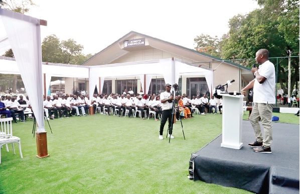 Kofi Adams (right), Minister of Sports and Recreation, addressing members of the Keep Fit club during the inauguration