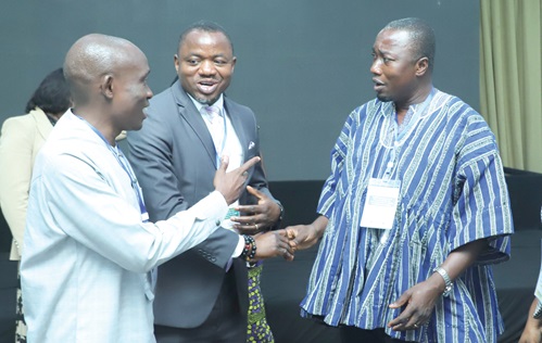 Dr Franklin Asiedu-Bekoe (left), Director, Public Health, GHS; Prof. Titus Beyuo (2nd from left), Member of the Parliamentary Select Committee on Health, and Dr Lawrence Ofori Boadu (right), Director, Institutional Care Division, GHS, in a discussion at the event. Picture: EDNA SALVO KOTEY