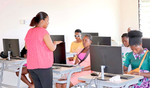 Emma Nana Oteng (left), a facilitator,  with some of the participants in the Somanya training