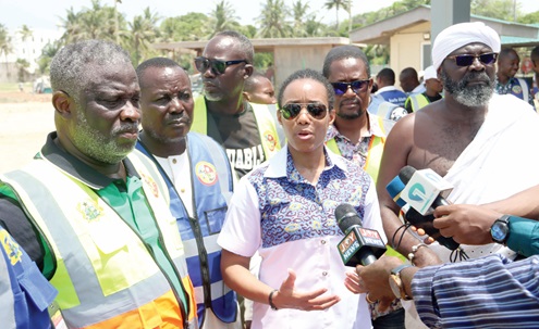 Dr Zanetor Agyeman-Rawlings (middle), MP, Klottey Korle, addressing the press during a working visit to some projects in the assembly. With her are Alfred Gaisie (left), Municipal Chief Executive, Korle Klottey, and some members of the municipal assembly. Picture: ELVIS NII NOI DOWUONA