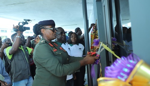 DCOS (med) Brig Gen Evelyn Vivian Abraham-Kwabiah (left), Commander of 37 Military Hospital and Acting Deputy Chief of Staff Medical and Prosper K. Appiah (2nd from left), Director of P.K Appiah Foundation cutting a tape to inaugurate the tuberculosis control unit office of the 37 Military Hospital. Looking on are some dignitaries Picture: EDNA SALVO KOTEY