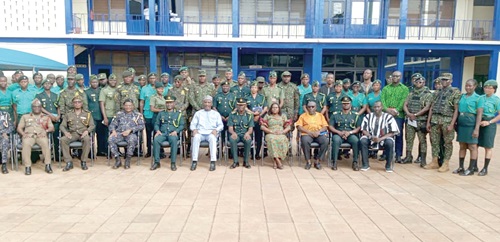 Mohammed-Mubarak Muntaka (seated middle),  Minister for the Interior, with some security officers in Tamale