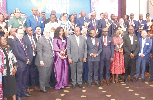 President John Mahama (6th from right) with Ernest De-Graft Egyir (5th from right), Founder, CEO Summit; Moses Baiden (2nd from right), CEO, Margins Group, and the award winners at the event in Accra. Picture: ELVIS NII NOI DOWUONA