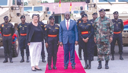US Ambassador Virginia Palmer with the Minister of Defence, Edward Kofi Omane Boamah, and some service personnel