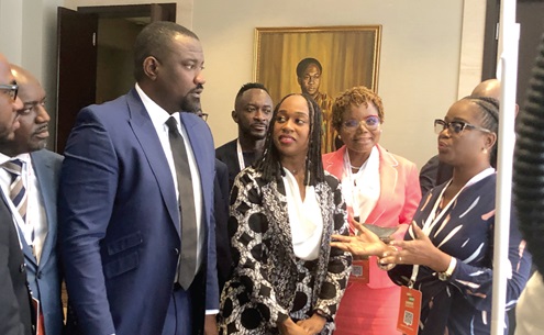 An Exhibitor explaining to John Setor Dumelo (2nd from left), Deputy Minister of Food and Agriculture; Fanta Conde (3rd from right), Allswell Abankwa (2nd from right) and other dignitaries about their products and services during an exhibition