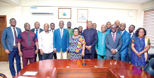 Haruna Iddrisu (4th from left), Education Minister, Dr Clement Apaak (6th from left), Deputy Education Minister, with Council members and some management members of the ministry after the inauguration 