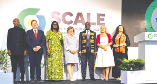 Haruna Iddrisu (3rd from right), Education Minister, Dr Clement Apaak (left), Deputy Education Minister, and Simone Giger (2nd from right), Ambassador of Switzerland to the Republic of Ghana, with other partners after the signing of the agreement