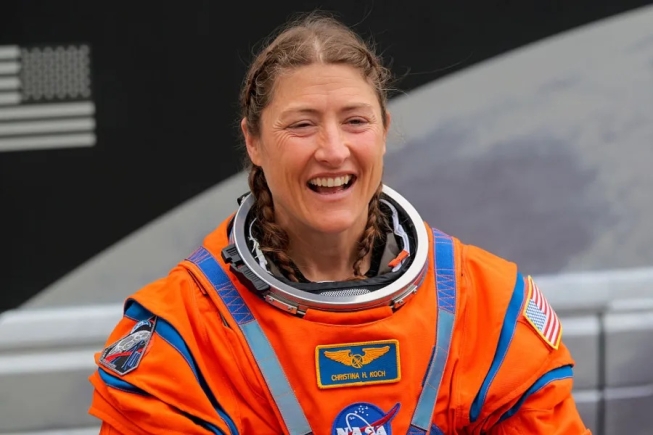 Christina Koch becomes first woman to travel around the moon on Artemis II