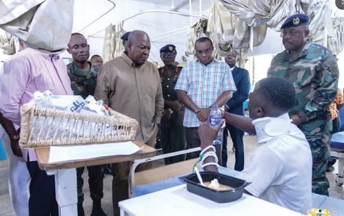 A victim of the El-Wak Stadium tragedy explaining to President John Dramani Mahama and other government officials what happened at the scene