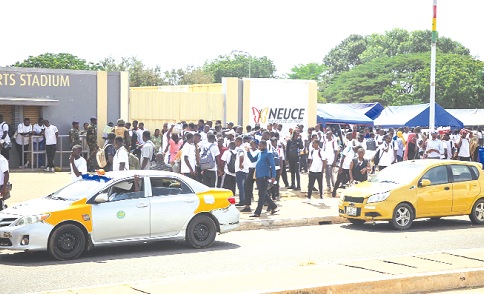 Some of the recruits in front of the El-Wak Stadium waiting to be called to the recruitment Centre before the disaster last Thursday